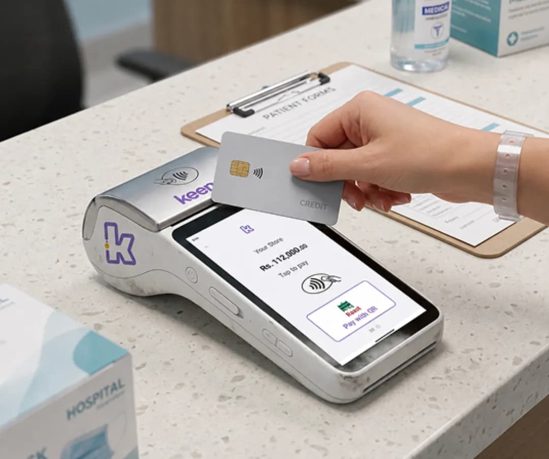 Keenu terminal reading a card and applying the correct insurance or partner rate at a clinic