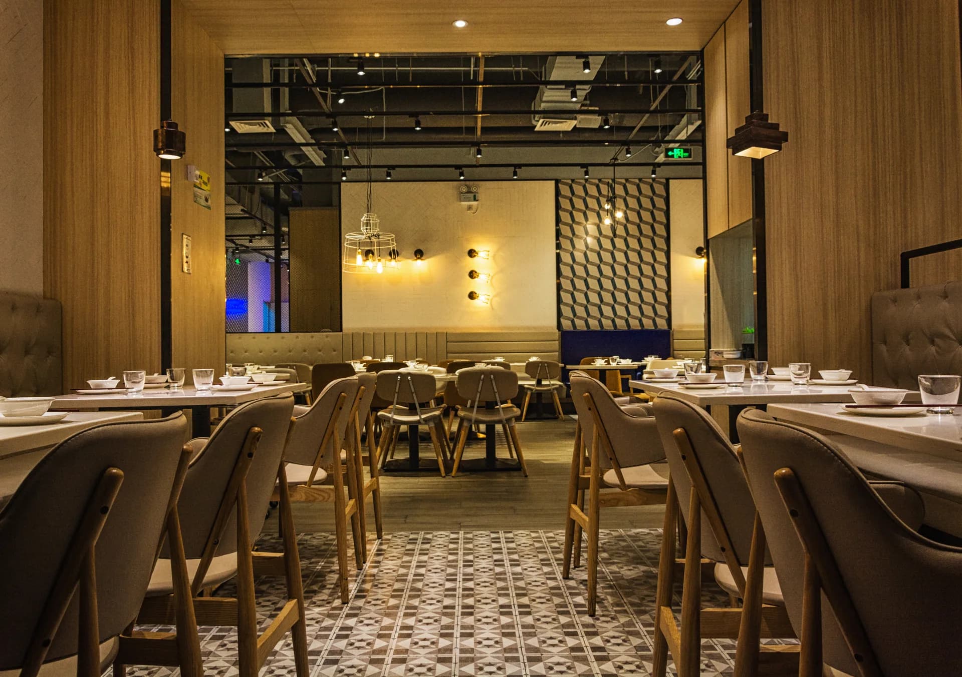 A warmly lit restaurant dining room